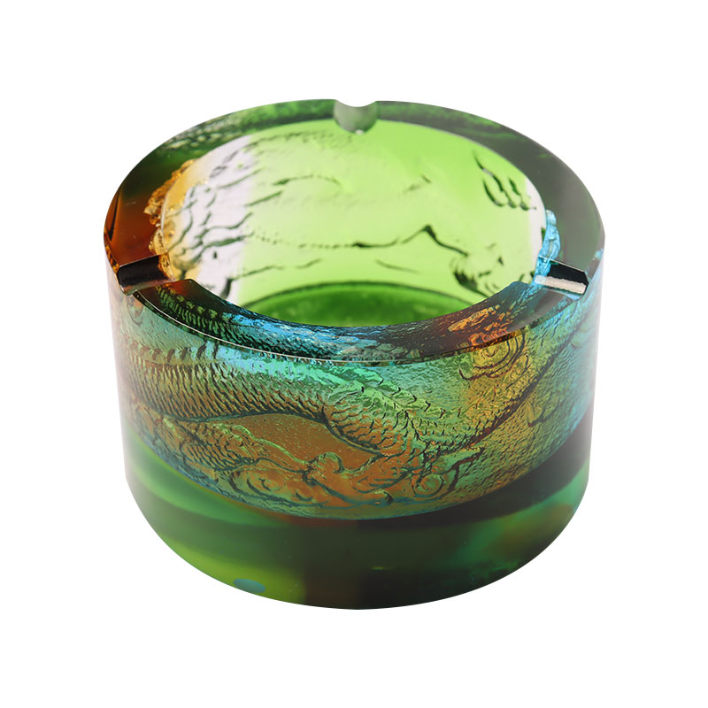 Asbak kaca dengan motif naga keluar laut