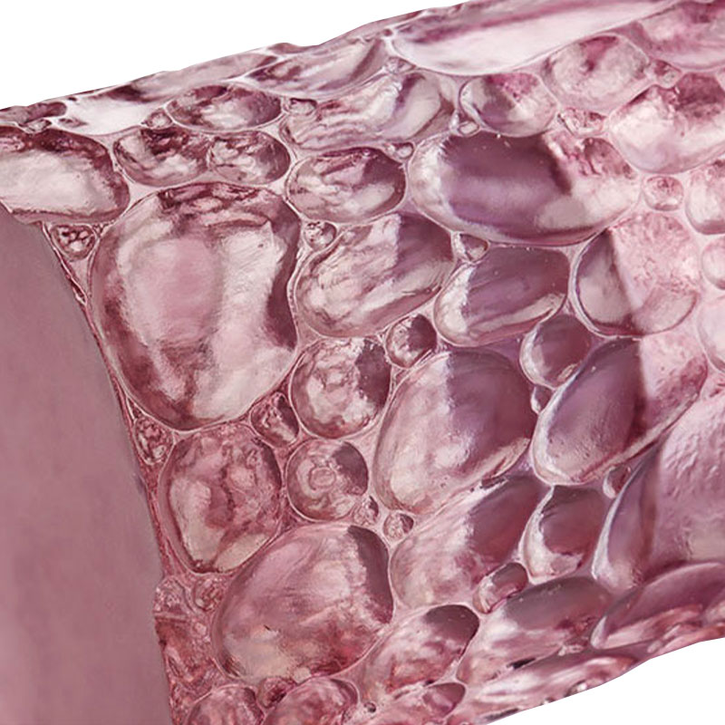 Tekstur kerikil vas kaca merah muda ungu