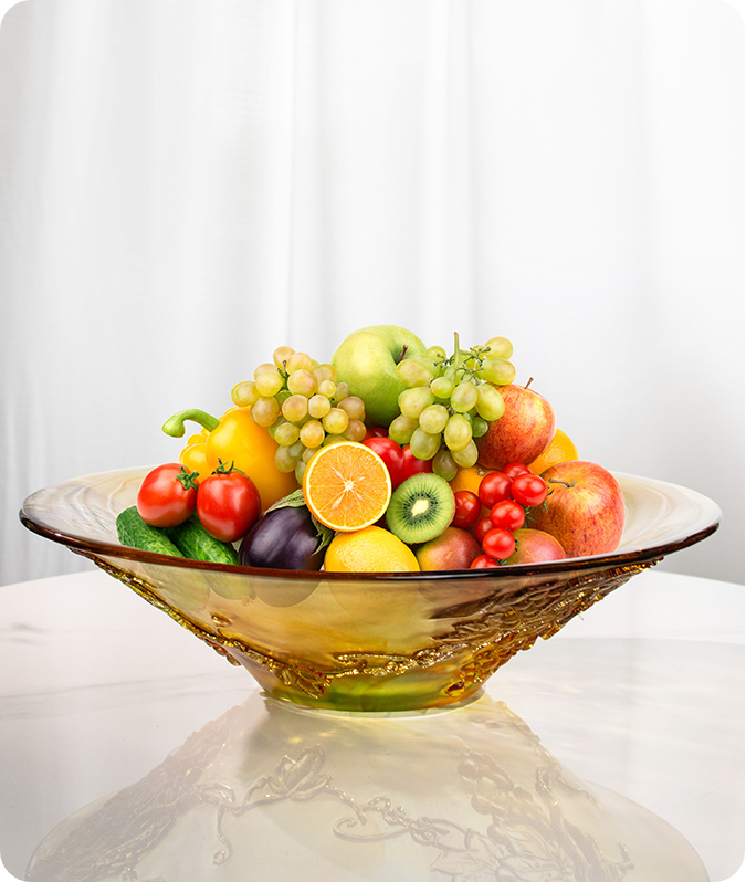Bejana Kaca Bermulut Lebar Berisi Buah-buahan